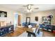 Comfortable office with wood floors, ceiling fan, shelving unit and neutral walls at 2899 Doncaster Dr, Charleston, SC 29414