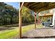 Home backyard with wooded area, open space, and covered patio at 2920 Woodland Park Dr, Mount Pleasant, SC 29466