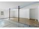 Unfinished basement with concrete floors, support beams, and a door at 2920 Woodland Park Dr, Mount Pleasant, SC 29466