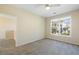 Inviting bedroom with a large window, neutral walls, and plush carpet flooring at 2920 Woodland Park Dr, Mount Pleasant, SC 29466