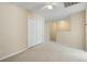This bedroom has a neutral carpet, ceiling fan, and large closet at 2920 Woodland Park Dr, Mount Pleasant, SC 29466