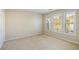 Bedroom with a neutral carpet and multiple windows for natural light at 2920 Woodland Park Dr, Mount Pleasant, SC 29466