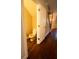 Cozy half bathroom with hardwood floors next to the stairway at 2926 Sugarberry Lane Ln, Johns Island, SC 29455
