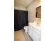 Nicely appointed bathroom with a dark shower curtain and white vanity at 2926 Sugarberry Lane Ln, Johns Island, SC 29455
