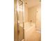 Bathroom showcasing a soaking tub with shower, partial glass enclosure, and tile flooring at 2926 Sugarberry Lane Ln, Johns Island, SC 29455