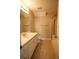 Bathroom featuring a vanity, tile floors, a toilet, and a glass-enclosed shower at 2926 Sugarberry Lane Ln, Johns Island, SC 29455