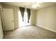 Carpeted main bedroom with sliding glass door leading to the backyard at 2926 Sugarberry Lane Ln, Johns Island, SC 29455