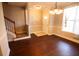 Inviting dining area with hardwood floors and a decorative chandelier near the staircase at 2926 Sugarberry Lane Ln, Johns Island, SC 29455