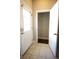 Bright foyer with tiled floors leading to a closet and the front door at 2926 Sugarberry Lane Ln, Johns Island, SC 29455