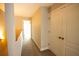 Upstairs hallway featuring carpet and a linen closet at 2926 Sugarberry Lane Ln, Johns Island, SC 29455