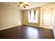 Open living room featuring hardwood floors, neutral walls, and a ceiling fan at 2926 Sugarberry Lane Ln, Johns Island, SC 29455