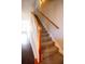 Carpeted stairway with wood handrails and white spindles at 2926 Sugarberry Lane Ln, Johns Island, SC 29455