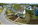 Aerial view of a spacious home with a welcoming front porch and meticulously landscaped yard at 2961 Yachtsman Dr, Mount Pleasant, SC 29466