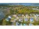 A beautiful aerial view of a marsh-adjacent neighborhood, with lush trees at 2961 Yachtsman Dr, Mount Pleasant, SC 29466