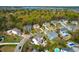 Aerial view of a residential neighborhood with mature trees and waterfront access at 2961 Yachtsman Dr, Mount Pleasant, SC 29466