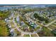 Beautiful aerial view of a coastal community with lush landscaping, manicured lawns, and stunning marsh views at 2961 Yachtsman Dr, Mount Pleasant, SC 29466