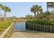 Community boat ramp with serene water views and lush greenery in the background at 2961 Yachtsman Dr, Mount Pleasant, SC 29466