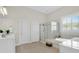 Bathroom features tile floors, double vanities, soaking tub, and a glass-enclosed shower at 2961 Yachtsman Dr, Mount Pleasant, SC 29466