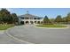 Elegant clubhouse featuring a grand entrance, well-manicured grounds, and ample parking at 2961 Yachtsman Dr, Mount Pleasant, SC 29466