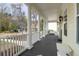 Charming front porch with white columns, a welcoming entryway and a cozy place to sit and relax at 2961 Yachtsman Dr, Mount Pleasant, SC 29466