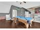 Entertainment room with a billiard table, wood flooring, and stylish decor at 2961 Yachtsman Dr, Mount Pleasant, SC 29466