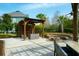 Inviting outdoor patio area, complete with comfortable seating, a pergola, and a cozy fire pit at 2961 Yachtsman Dr, Mount Pleasant, SC 29466
