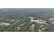 Aerial view of wooded community and nearby buildings at 3166 Edenvale Rd, Johns Island, SC 29455
