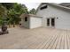 A charming back deck with a wood-burning fireplace and access to the main house at 3166 Edenvale Rd, Johns Island, SC 29455