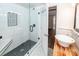 Modern bathroom with glass shower, black fixtures, and patterned floor tiles at 3166 Edenvale Rd, Johns Island, SC 29455