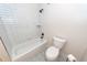 Well-lit bathroom showcasing a white subway-tiled shower and a coordinating toilet at 3166 Edenvale Rd, Johns Island, SC 29455
