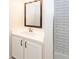 Bright bathroom featuring a modern vanity with a white countertop and a framed mirror above at 3166 Edenvale Rd, Johns Island, SC 29455