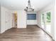 Dining room area with built-in cabinets and french doors leading to the backyard at 3166 Edenvale Rd, Johns Island, SC 29455