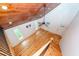 Open-concept living room features hardwood floors, wood-paneled ceilings, and bright windows at 3166 Edenvale Rd, Johns Island, SC 29455