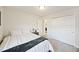 Cozy bedroom with gray carpet and an open door to another room at 3215 Safe Harbor Way, Charleston, SC 29414