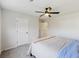 Bright bedroom featuring neutral walls, carpeted floors, and a ceiling fan with light at 3215 Safe Harbor Way, Charleston, SC 29414