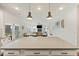 A well-equipped kitchen opens up to a dining area and living space creating an inviting atmosphere at 3215 Safe Harbor Way, Charleston, SC 29414