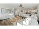 Bright, open-concept living room with modern decor flowing into the kitchen at 3215 Safe Harbor Way, Charleston, SC 29414