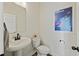 Stylish powder room with pedestal sink, modern fixtures, and fresh decor at 3215 Safe Harbor Way, Charleston, SC 29414