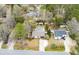 Aerial view showcases the property's backyard pool, shed, privacy fence, and landscaping at 3308 Island Estates Dr, Johns Island, SC 29455