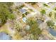 An aerial view of the property showcases the refreshing pool and surrounding trees at 3308 Island Estates Dr, Johns Island, SC 29455