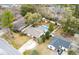 Aerial view of a house featuring a pool, fenced backyard, and proximity to neighboring houses at 3308 Island Estates Dr, Johns Island, SC 29455