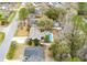 Aerial view showcases the property's backyard pool, shed, patio, privacy fence, and landscaping at 3308 Island Estates Dr, Johns Island, SC 29455