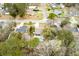 This shot shows the pool with mature trees surrounding the property at 3308 Island Estates Dr, Johns Island, SC 29455