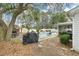 Enjoy outdoor living with a patio, pool, BBQ area, and privacy fence in this backyard at 3308 Island Estates Dr, Johns Island, SC 29455