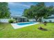 Large in-ground pool and well-manicured lawn are perfect for outdoor enjoyment and entertaining at 3308 Island Estates Dr, Johns Island, SC 29455