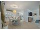 Cozy dining room features a round table with seating for four and a stylish woven pendant light at 3308 Island Estates Dr, Johns Island, SC 29455