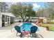 Backyard pool with lounge chairs, privacy fence and storage shed provides a relaxing oasis at 3308 Island Estates Dr, Johns Island, SC 29455