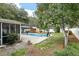 Backyard with pool, shed, and patio; perfect for outdoor living and entertaining at 3308 Island Estates Dr, Johns Island, SC 29455