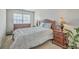 Comfortable bedroom with plush carpet, natural light, and stylish dark wood furniture at 343 Iveson Rd, Summerville, SC 29486