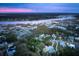 Breathtaking aerial view showcasing the home's location near a river and lush marshlands at 3894 Sawyers Island Dr, Mount Pleasant, SC 29466